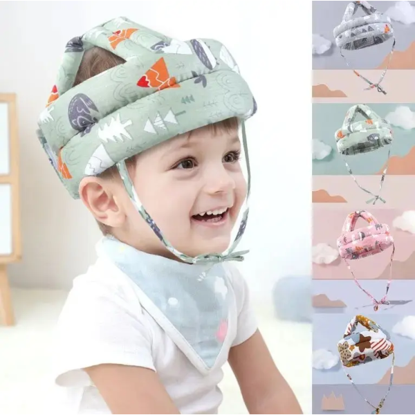 Bebé con casco protector acolchado verde menta