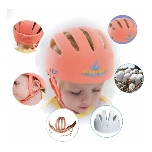 Bebé con casco protector acolchado rosa